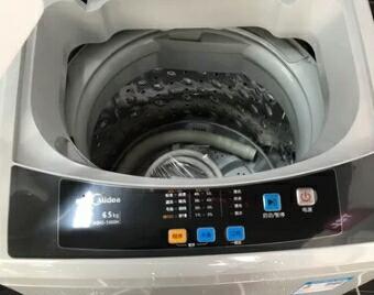 美的（Midea）MB65-1000H 6.5公斤KG 家用 品质电机 一键脱水全自动波轮洗脱一体洗晒单图